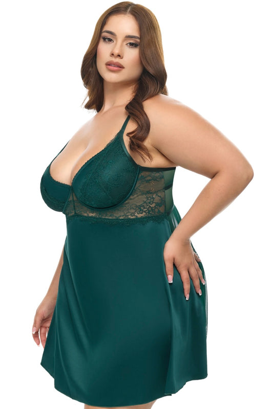 Woman wearing a green lace nightgown on a white background