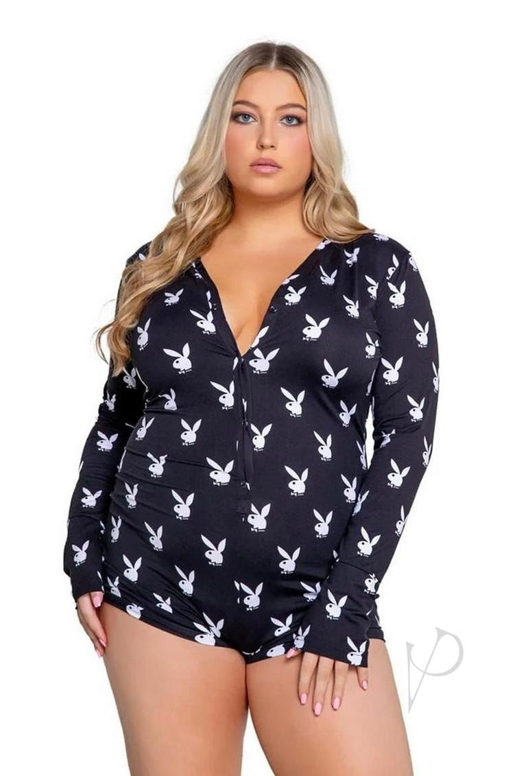 Woman wearing a black swimsuit with white bunny logo on a white background